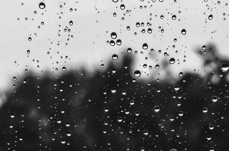 PEACE.✌️ photo of rain on a window